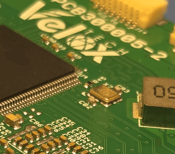 Close-up of a Velox printed circuit board and electronic components